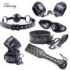 Thierry-Crimson-black-Tied-Ultimate-Bondage-Kit-blindfold-ball-gag-collar-wrist-and-ankle-cuffs-paddle